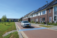 Afkoppelen met afvoer over straat Afkoppelen met afvoer over straat